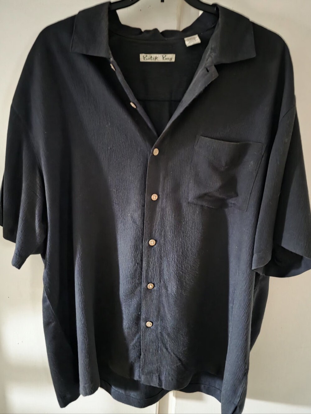 Men’s Black Short-Sleeve Button-Up Shirt by "Batik Bay"...